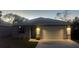 Charming single-story home features a two-car garage and well-manicured lawn in a desirable neighborhood at 534 S Adelle Ave, Deland, FL 32720