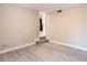 This room features light gray floors and neutral walls, with a view to another room at 5615 Arundel Dr, Orlando, FL 32808