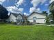 Charming home with a well-manicured lawn, mature landscaping, and decorative rock features at 5804 Plum Pudding Ct, Orlando, FL 32821