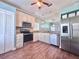 Well-equipped kitchen featuring stainless steel appliances, granite countertops, and ample cabinet space at 5804 Plum Pudding Ct, Orlando, FL 32821