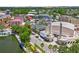 Aerial view of the charming downtown area with unique architecture and a scenic waterfront at 660 Celebration Ave # 250, Kissimmee, FL 34747
