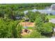 Aerial view of the playground, picnic shelter, and lake, creating a great space for families at 660 Celebration Ave # 250, Kissimmee, FL 34747