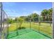 Back yard with fenced in pet area and mature landscaping at 700 Old Geneva Rd, Geneva, FL 32732