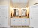 Bright bathroom with granite counters, double sinks, and ample storage space at 700 Old Geneva Rd, Geneva, FL 32732