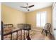 Bedroom featuring natural light, neutral paint, and ceiling fan at 700 Old Geneva Rd, Geneva, FL 32732