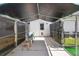 Dog run with shelter including fencing, seating, and hose at 700 Old Geneva Rd, Geneva, FL 32732