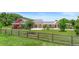 Charming home with a large front yard and decorative wooden fence at 700 Old Geneva Rd, Geneva, FL 32732