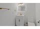 Stylish bathroom with LED mirror, modern vanity, and gold fixtures at 7331 Blue Jacket W Pl, Winter Park, FL 32792