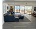 Comfortable living room with access to a spacious patio area, perfect for indoor-outdoor living at 7331 Blue Jacket W Pl, Winter Park, FL 32792
