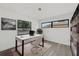 Bright office space with modern desk, stylish chair, and large windows offering plenty of natural light at 7331 Blue Jacket W Pl, Winter Park, FL 32792
