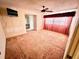 Large bedroom features a ceiling fan and walk-in closet at 8547 Cedar Cove Dr, Orlando, FL 32819