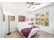 Bright bedroom features a queen-sized bed, natural light, and stylish decorative accents at 860 N Orange Ave # 210, Orlando, FL 32801