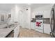 Bright kitchen with modern appliances, white cabinets and lots of counter space at 860 N Orange Ave # 210, Orlando, FL 32801