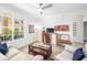 Inviting living room with modern decor, plenty of natural light and tile flooring at 860 N Orange Ave # 210, Orlando, FL 32801