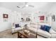 Cozy living room with tile flooring, white walls, and modern furniture at 860 N Orange Ave # 210, Orlando, FL 32801