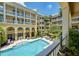 Courtyard view of the community pool and lounge area at 860 N Orange Ave # 210, Orlando, FL 32801