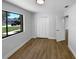 Bedroom showcasing a closet and views of the neighborhood at 9744 Tattersall Ave, Orlando, FL 32817