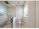 Modern bathroom with glass shower and beautiful tile work at 10750 Sw 110Th St, Dunnellon, FL 34432