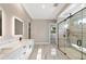 Modern main bathroom featuring a glass shower, double vanity, and tile floors at 10750 Sw 110Th St, Dunnellon, FL 34432