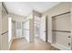 Large walk-in closet featuring custom shelving and a view into the bathroom at 10750 Sw 110Th St, Dunnellon, FL 34432