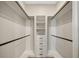 Custom walk-in closet with shelving and drawers for organizing your wardrobe at 10750 Sw 110Th St, Dunnellon, FL 34432