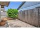 Cozy backyard with concrete patio and wood fence providing a private outdoor area at 110 Todd Dr, Casselberry, FL 32707