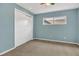 A charming bedroom with a closet and a window allowing for natural light at 110 Todd Dr, Casselberry, FL 32707