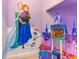 Charming bedroom featuring custom Frozen-themed decor, including Anna, Elsa, Olaf mural and castle at 1164 Castle Pines Ct, Reunion, FL 34747