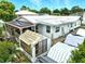 Backyard showcasing a deck, shed, and potential garden area under a sunny sky at 130 Masterpiece Rd, Lake Wales, FL 33898