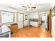 Bright living room with wood floors, counter and cabinetry at 130 Masterpiece Rd, Lake Wales, FL 33898