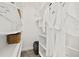 Walk-in closet with custom shelving offering ample storage and organization space at 139 Douglas St, Edgewater, FL 32141
