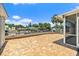 Sunny brick deck with canal view at 139 Douglas St, Edgewater, FL 32141