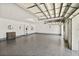 Spacious garage with epoxy flooring and open doors at 139 Douglas St, Edgewater, FL 32141
