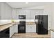 Modern kitchen boasts granite countertops and stainless steel appliances at 139 Douglas St, Edgewater, FL 32141
