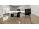 Modern kitchen features granite countertops, under-cabinet lighting, and stainless steel appliances at 139 Douglas St, Edgewater, FL 32141