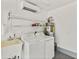 Bright laundry room with washer, dryer, and sink at 139 Douglas St, Edgewater, FL 32141
