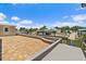 Brick patio featuring canal views, a small outbuilding, and vinyl fencing at 139 Douglas St, Edgewater, FL 32141