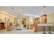 Bright and open-concept living area connects seamlessly to the kitchen and dining spaces at 1609 Glen Eagles Way, Orlando, FL 32804
