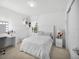Bright bedroom with large window, vanity, and comfortable decor at 17426 Saw Palmetto Ave, Clermont, FL 34714