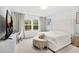 Comfortable bedroom with large windows, plush decor, and bright interior at 17426 Saw Palmetto Ave, Clermont, FL 34714