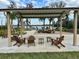 Inviting outdoor common area with comfortable seating and scenic views, perfect for relaxation at 17426 Saw Palmetto Ave, Clermont, FL 34714