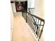 Hallway features movie-themed wallpaper and wooden railing at 17426 Saw Palmetto Ave, Clermont, FL 34714