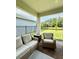 Covered patio with a fire pit and views of the backyard at 17426 Saw Palmetto Ave, Clermont, FL 34714