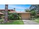 Charming single-Gathering home with a lush front yard and an attached two-car garage in a quiet neighborhood at 199 Heron Bay Cir, Lake Mary, FL 32746