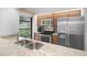 Bright kitchen with stainless steel appliances, granite countertops, and a window overlooking the outdoors at 199 Heron Bay Cir, Lake Mary, FL 32746