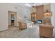 Inviting living room featuring a cozy fireplace with built-in shelving, perfect for relaxation at 199 Heron Bay Cir, Lake Mary, FL 32746