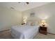 Serene main bedroom with a comfortable bed, soft lighting, and cozy neutral decor at 199 Heron Bay Cir, Lake Mary, FL 32746