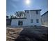 New construction home featuring a sliding glass door and a bright white exterior at 230 Lucile Way, Orlando, FL 32835