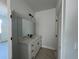 Modern bathroom with a large mirror, sleek vanity, and black hardware accents at 230 Lucile Way, Orlando, FL 32835