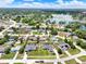 An aerial view of a quiet neighborhood with single Gathering homes and swimming pools at 2375 Belen Dr, Deltona, FL 32738